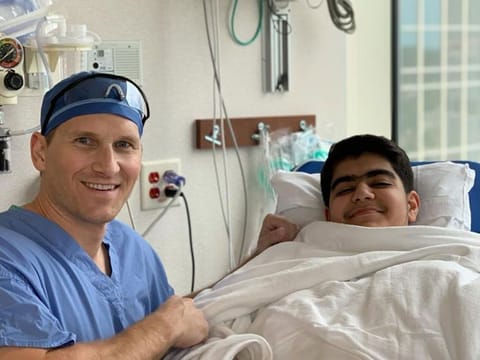 Dr Aaron Krych with Ahmad Amer Sharif after the surgery.