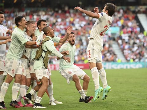 Spain celebrate after beating Croatia 5-3 in the last 16 Euro 2020 championship match at the Parken Stadium in Copenhagen.