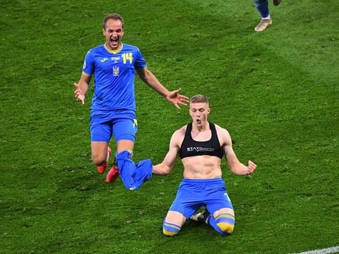 Ukraine's Artem Dovbyk celebrates scoring their second goal with Yevhenii Makarenko.