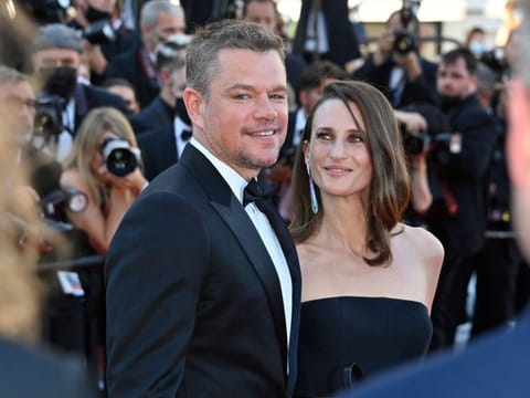 US actor Matt Damon and French actress Camille Cottin pose as they arrive for the screening of the film "Stillwater" at the 74th edition of the Cannes Film Festival in Cannes, southern France, on July 8, 2021.