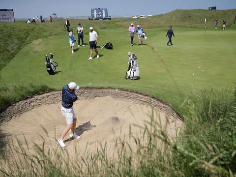 Golfers during a practice round for the Open at Royal St George's