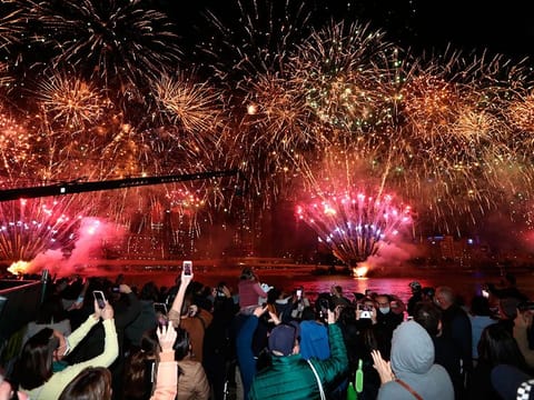 People celebrate in Brisbane following an announcement by the International Olympic Committee that Brisbane was picked to host the 2032 Olympics.