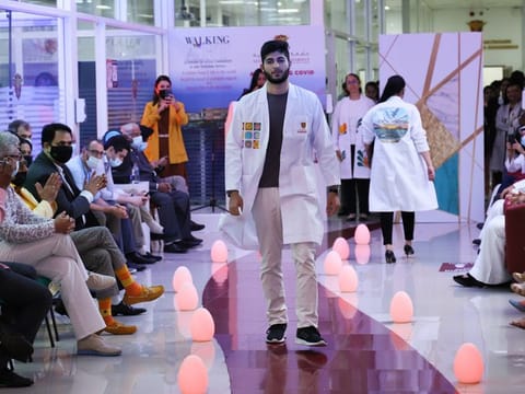 In the ‘White Coat Fashion Show’, the white coats were painted in 27 different designs by artists in the UAE, who paid their tributes to health-care workers in the country.