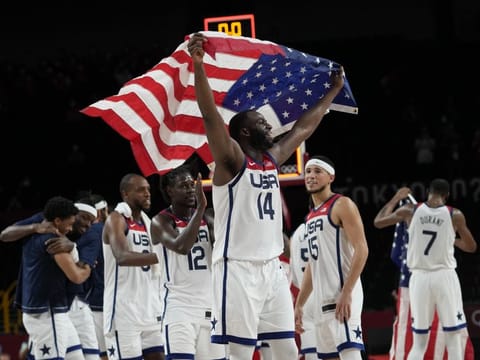 United States' players celebrate after their win in the men's basketball gold medal game against France at the 2020 Summer Olympics in Saitama, Japan.