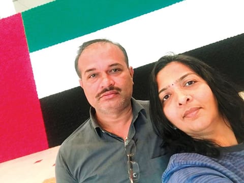 Indian expat Khushbuben with her husband Nileshkumar Chitaniya during happier times