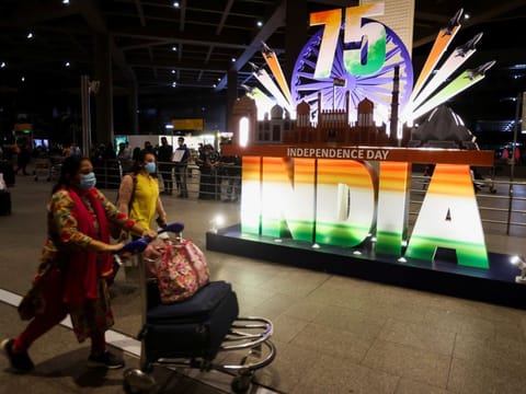Passengers exit the Chhatrapati Shivaji Maharaj International Airport on the eve of India's 75th Independence Day in Mumbai, India, August 14, 2021. With the consecutive extension of the ban on direct flights, the only way for Indian students who have got admission to Canada universities is to take a connecting flight to Canada where they will have to obtain a negative RT-PCR certificate from a third country. That third country has to be on the approved list of Canada.