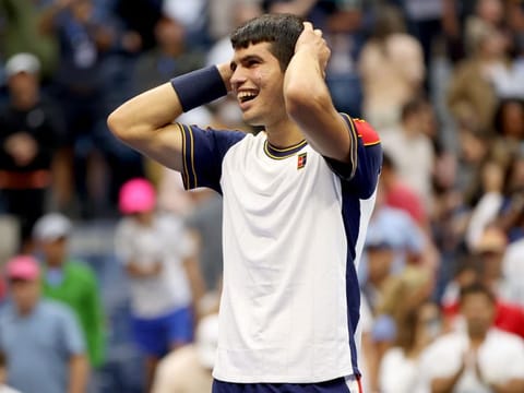 Carlos Alcaraz of Spain celebrates after defeating Stefanos Tsitsipas of Greece during his Men's Singles third round match on Day Five at USTA Billie Jean King National Tennis Center in New York City.