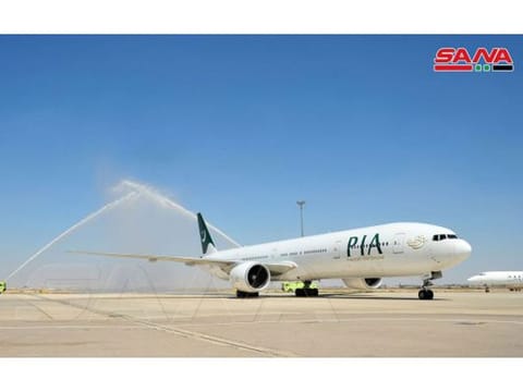 The PIA plane lands at Damascus airport.
