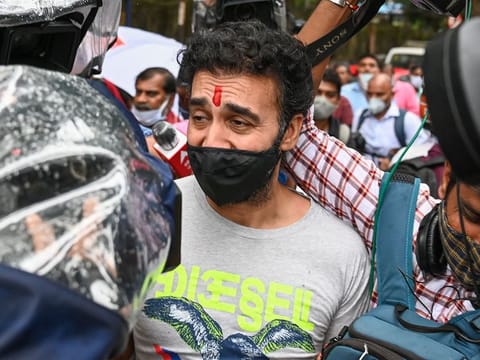 Businessman Raj Kundra in this file photo where he is being escorted by police after his arrest in a pornography racket last year. Kundra has denied he had anything to do with the racket.