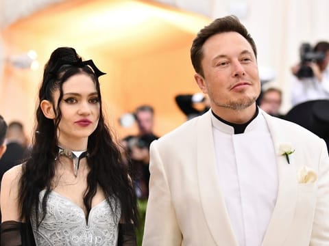 Singer Grimes and Elon Musk. Musk has 11 children with three women, including six with his ex-wife Justine Wilson.