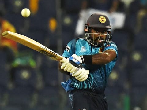 Sri Lanka’s Charith Asalanka plays a shot during the ICC Men’s Twenty20 World Cup cricket match against West Indies at the Zayed Cricket Stadium in Abu Dhabi on November 4, 2021.