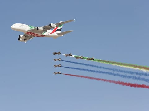 An Emirates A380 and the Al Fursan aerobatic team at the 2019 airshow in Dubai.