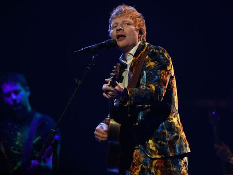 English singer-songwriter Ed Sheeran perforems on stage during the MTV Europe Music Awards at the Laszlo Papp Budapest Sports Arena in Budapest, Hungary on November 14, 2021.