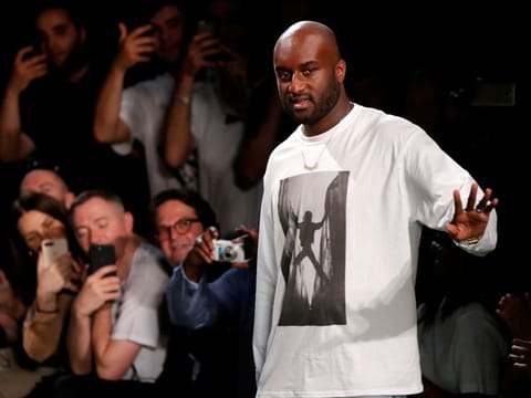 Designer Virgil Abloh appears at the end of his Spring/Summer 2019 collection for Off-white fashion label during Mens’ Fashion Week in Paris, France, June 20, 2018.