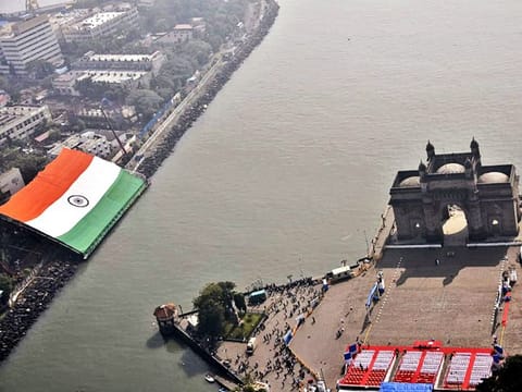 The world's largest National Flag unveiled by the Western Naval Command near Gateway of India on the occasion of Navy Day, at Naval Dockyard, in Mumbai on Saturday.
