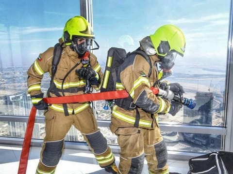 Firefighters during the drill at Burj Khalifa in Dubai on Monday