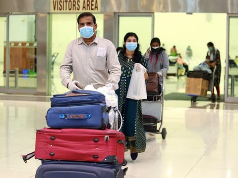Passengers exit the Kochi International Airport in Kerala.