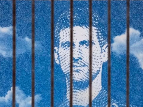 A billboard depicting Serbian tennis player Novak Djokovic on a building in Belgrade, Serbia, Monday, Jan. 10, 2022.