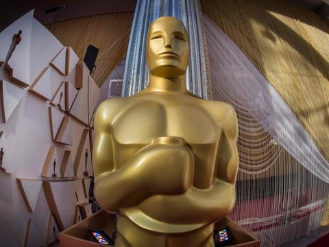 In this file photo taken on February 8, 2020 an Oscars statue is displayed on the red carpet area on the eve of the 92nd Oscars ceremony at the Dolby Theatre in Hollywood, California.