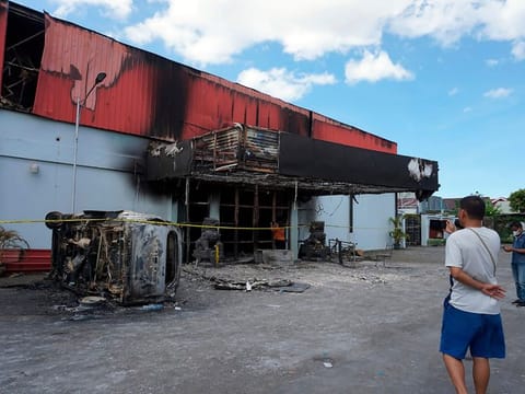 The burned nightclub after two groups clashed in Sorong, West Papua province, Indonesia, on January 25, 2021.