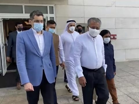 Kerala Chief Minister Pinarayi Vijayan (R) was received by the Consul General of India in Dubai, Dr Aman Puri (L), and other protocol officials at Dubai International Airport on Saturday