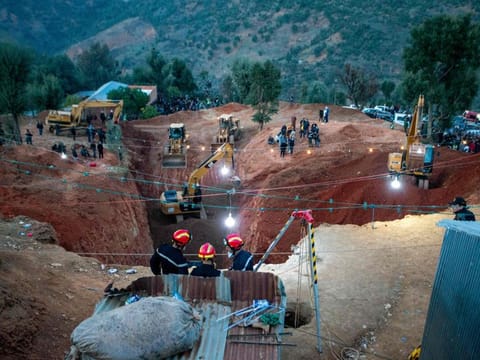 Moroccan authorities and firefighters work to rescue five-year-old boy Rayan, who is trapped in a deep well , near Bab Berred in Morocco's rural northern province of Chefchaouen.