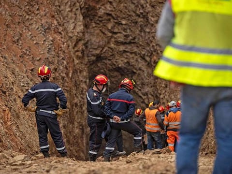 Moroccan emergency services teams work on the rescue of five-year-old boy Rayan, whose death shocked the nation.