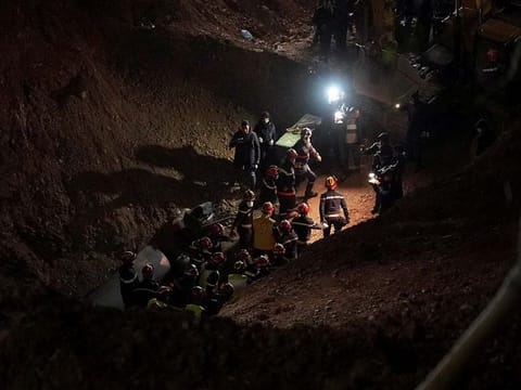 Rescue workers carry 5-year-old child, Rayan Awram, who has been trapped for five days in a well, to an ambulance, during a rescue operation near Chefchaouen, northern Morocco February 5, 2022.
