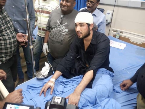 Iqrar Ul Hassan, under treatment at a Karachi's hospital, after allegedly being tortured at Intelligence Bureau's office.
