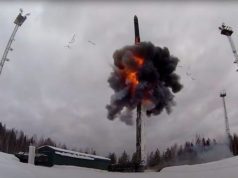 A Russian Yars intercontinental ballistic missile is launched during the exercises by nuclear forces in an unknown location in Russia, in this still image taken from video released February 19, 2022.