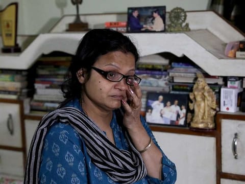 Pratibha Swarnakar, mother of Pushpak Swarnakar, a fifth-year medical student of western Ukraine's Ternopil National Medical University, weeps as she speaks about her son, who she said was among nearly 2,000 Indians taking shelter in bunkers, at her house in the outskirts of Kolkata, India, February 25, 2022.