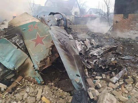 Remains of the Russian fighting aircraft are seen at a residential area, in Chernihiv, Ukraine.