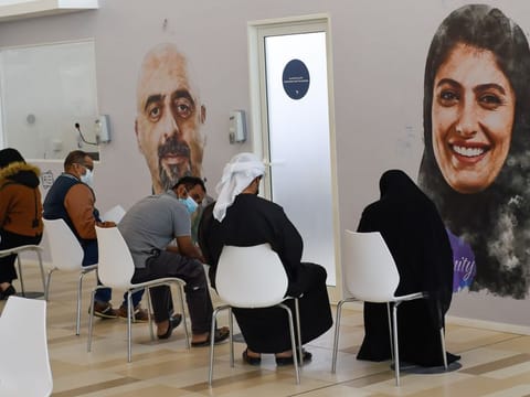 Visitors wait for their turn at a SEHA COVID-19 vaccination center at Mina Rashed in Abu Dhabi.