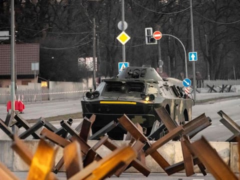 A Ukranian armoured vehicle drives along a road in the Ukranian capital Kyiv on March 19, 2022.