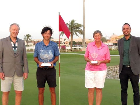 Victor Pena Cortes, second left, with the Abu Dhabi City Golf Club Championship trophy