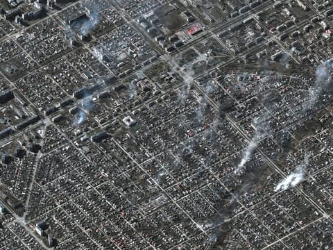 A satellite image shows an overview of burning buildings in Livoberezhnyi district, Mariupol, on March 22, 2022.