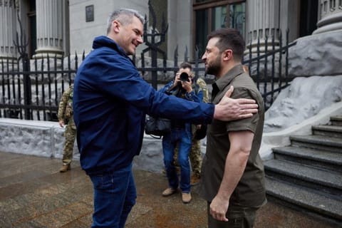 Ukrainian President Volodymyr Zelenskiy welcomes Austrian Chancellor Karl Nehammer before a meeting, as Russia's attack on Ukraine continues, in Kyiv, Ukraine April 9, 2022.