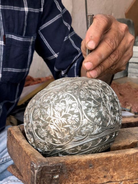 An artisan at work moulding Bidriware items at a foundry in Bidar’s craft cluster.
