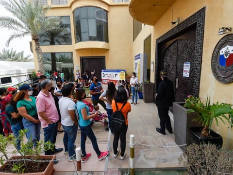 Overseas Filipinos wait to cast thier vote for the 2022 election, at the Philippine Consulate in Dubai.