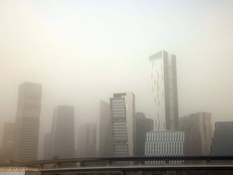 This picture taken on May 17, 2022 shows a view of skyline of the city centre of Riyadh during a heavy dust storm.