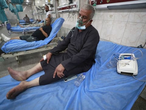 Iraqis receive treatment at an emergency ward in Sheikh Zayed Hospital in Baghdad as thousands were hospitalised across the country during a recent heavy sandstorm.
