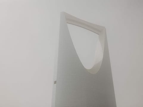 This picture taken on May 17, 2022 shows a view of the Kingdom Centre skyscraper in the centre of Saudi Arabia's capital Riyadh during a heavy dust storm.