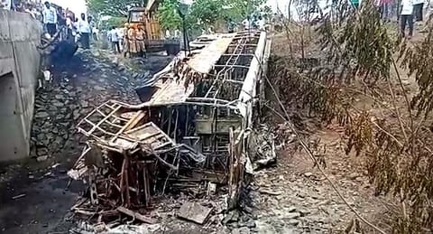 Charred remains of a bus are pictured after it collided with a goods vehicle and caught fire near Kamalapur village, in Kalaburagi on Friday, June 3, 2022.