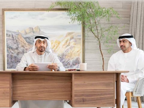 UAE President His Highness Sheikh Mohamed bin Zayed Al Nahyan delivers the opening speech at the first 'I2U2' virtual summit on Thursday. Sheikh Abdullah bin Zayed Al Nahyan, Minister of Foreign Affairs and International Cooperation, is also shown.