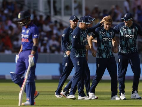 David Willey of England celebrates with teammates after taking the wicket of India's Virat Kohli during the second One Day International at Lord's on Thursday.