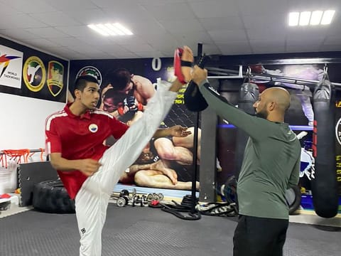 16-year-old Sinan Ahmed (left) is a taekwondo player for the Pakistan National Team and Sharjah Sports Club.