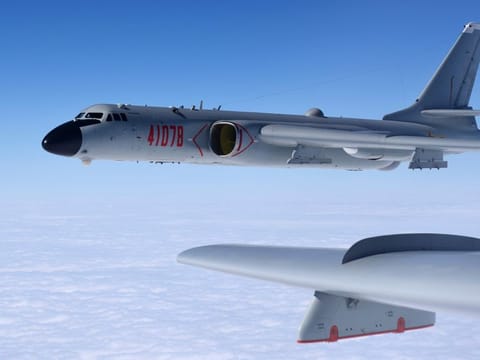 In this photo released by Xinhua News Agency, a Chinese military H-6K bomber is seen conducting training exercises, as the People's Liberation Army (PLA) air force conducted a combat air patrol in the South China Sea on Nov. 23, 2017.