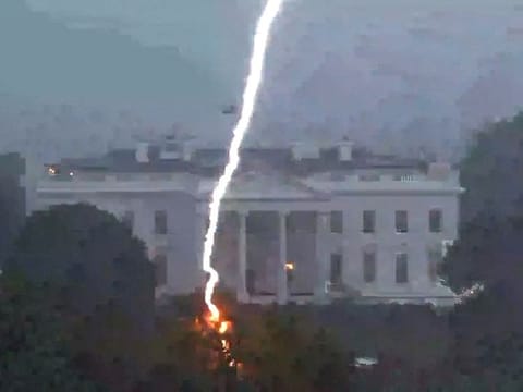 A lightning strike hits a tree in Lafayette Park across from the White House, killing three people and injuring one person below, during an August 4 evening thunderstom as seen in this framegrab from a Reuters TV video camera mounted on a nearby rooftop in Washington.