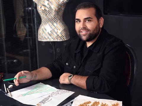 Tunisian designer Ali Karoui is drawn to the “mystery that surrounds the world of haute couture”.