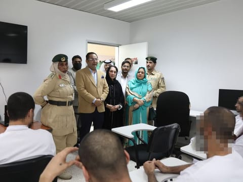 Representatives from Dubai Police and Danube Welfare Centre interacting with the inmates